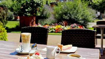 Breakfast, lunch, dinner served; garden views