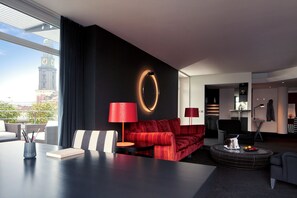 Penthouse, Multiple Beds | Living area | Flat-screen TV, tablet, offices