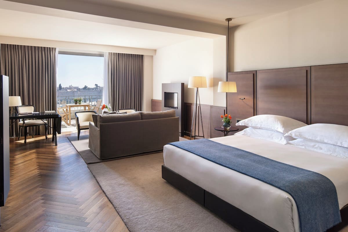 Junior Suite with Balcony and Old City View. | Premium bedding, pillow-top beds, in-room safe, desk