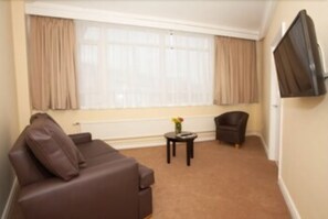 Tremannsrom, flere senger | Oppholdsområde | LCD-TV