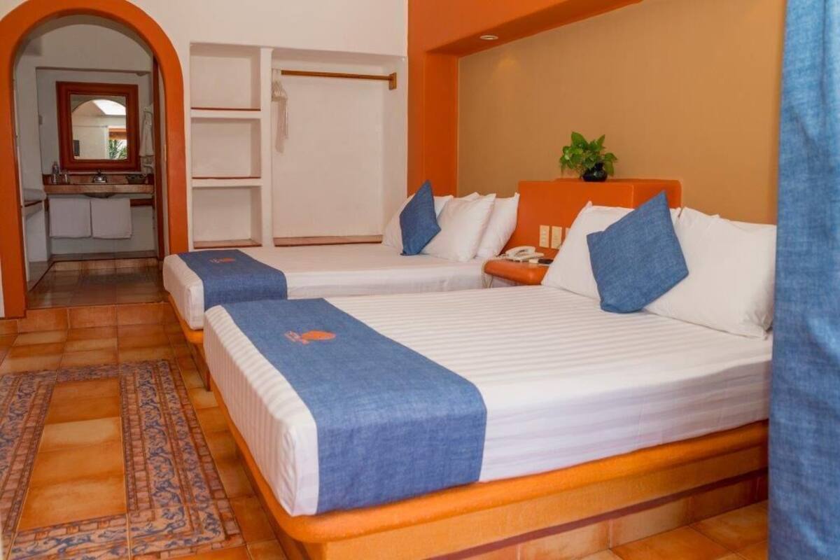 Luxe beddengoed, een kluis op de kamer, verduisterende gordijnen
