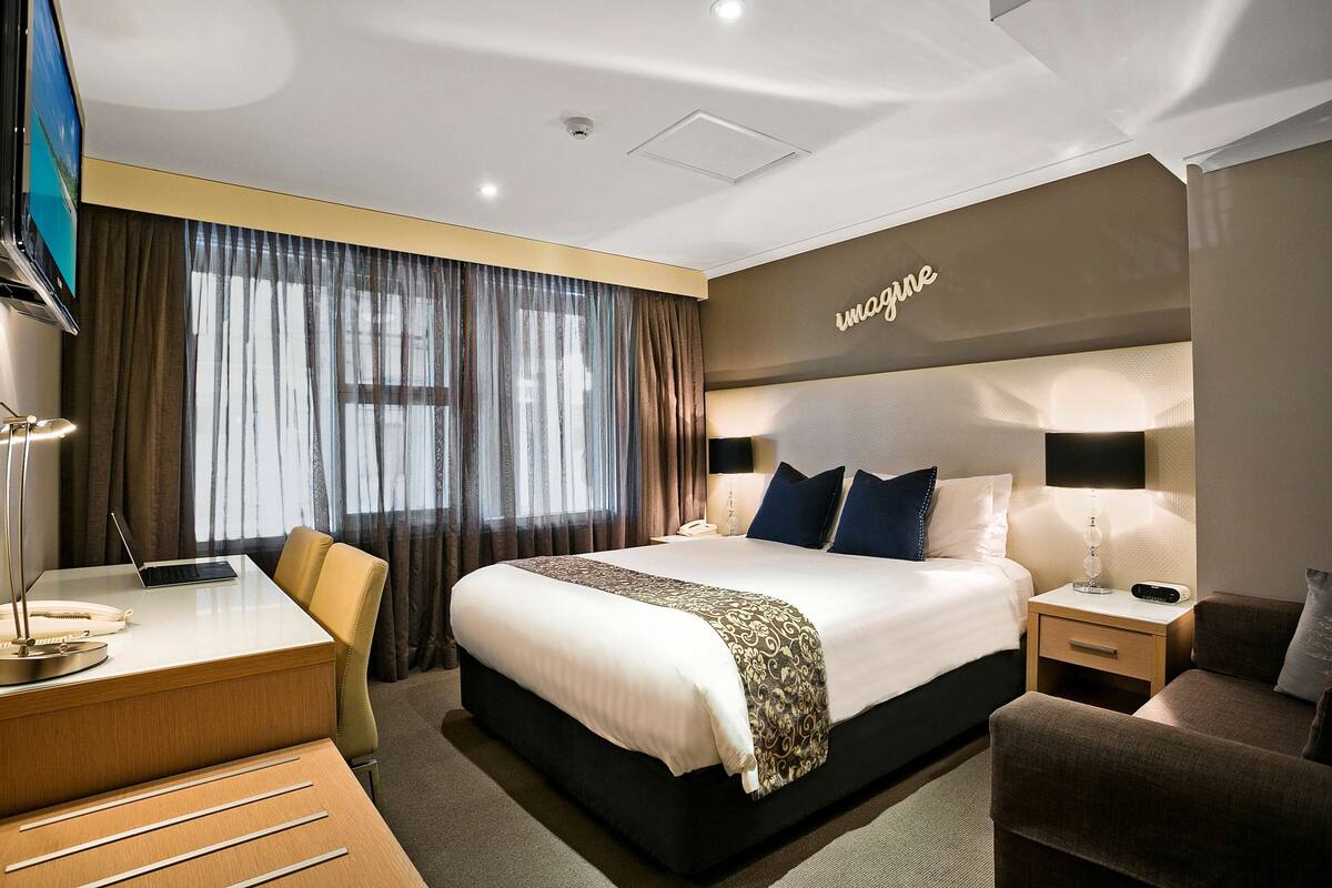 Minibar, laptop workspace, blackout curtains, iron/ironing board