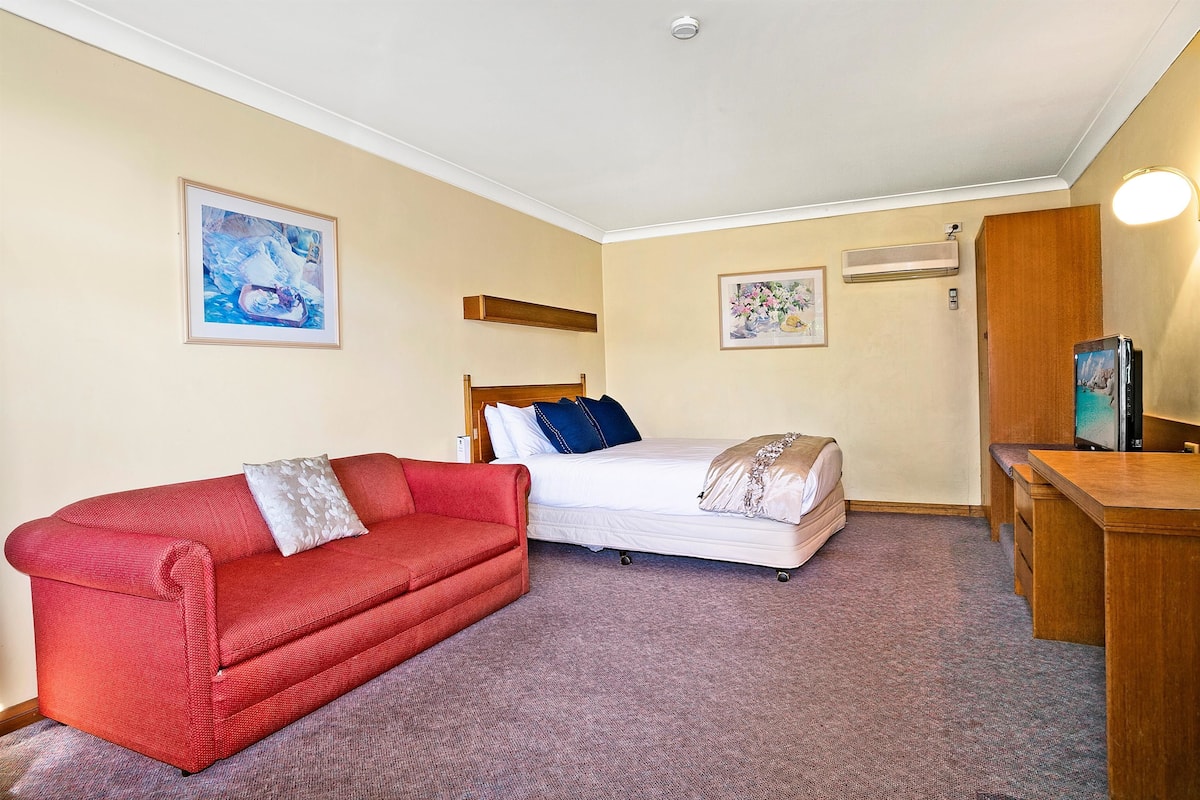 Minibar, laptop workspace, blackout curtains, iron/ironing board