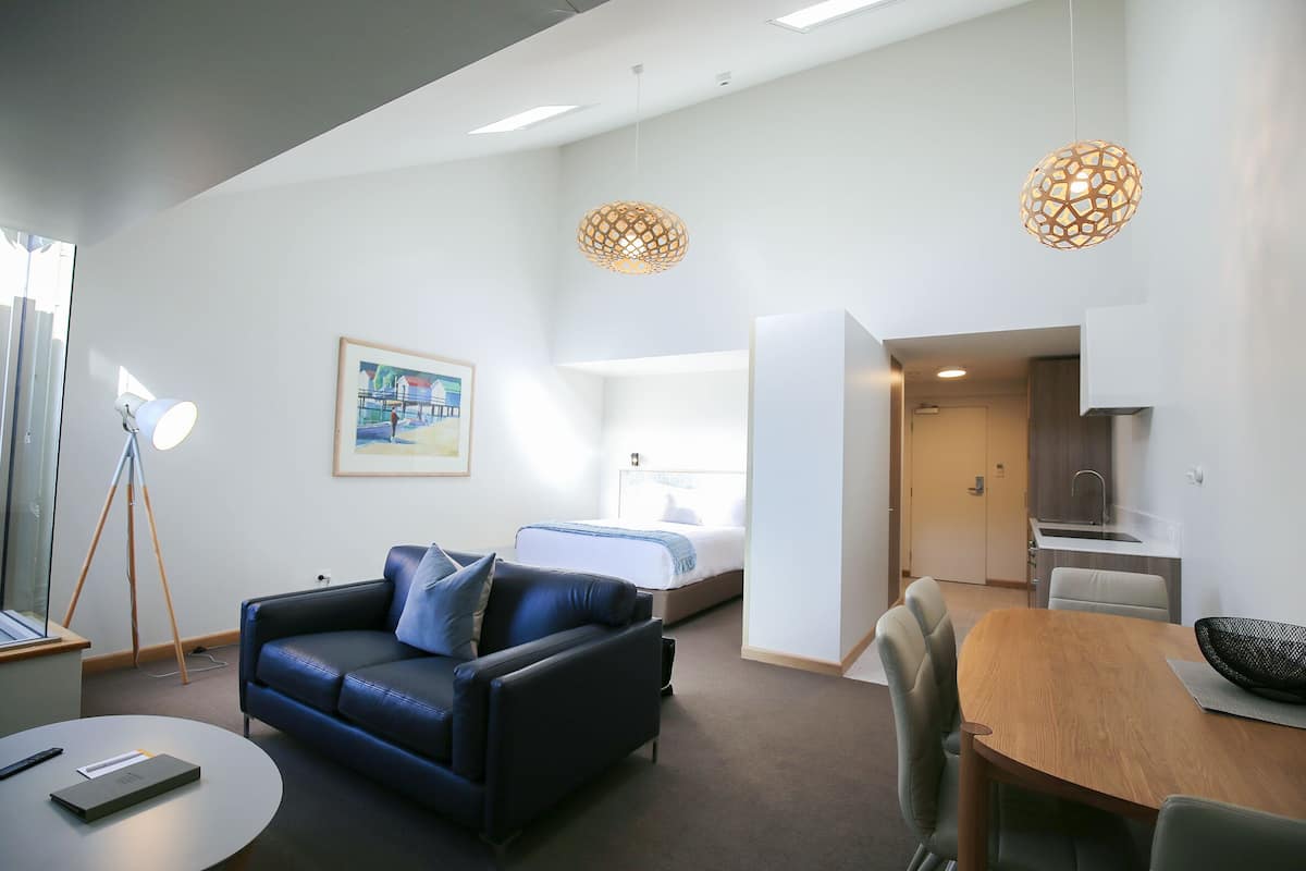 Suite | Living room | 55-inch Smart TV with cable channels