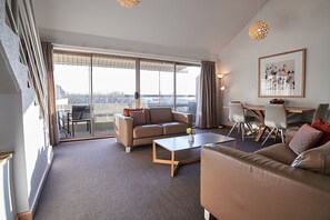 2 Bedroom Suite | Living area | 55-inch Smart TV with cable channels