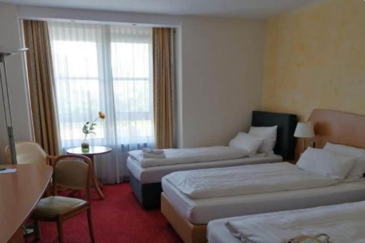 Comfort Triple Room | Living area