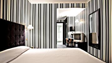 Habitación Doble Matrimonial | Down comforters, minibar, in-room safe, desk