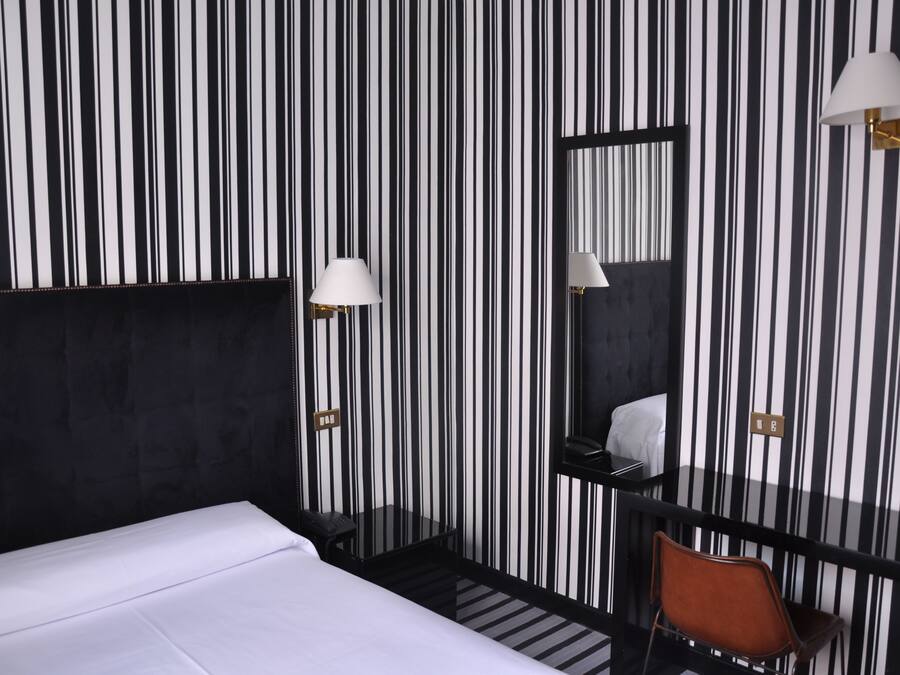 Down comforters, minibar, in-room safe, desk