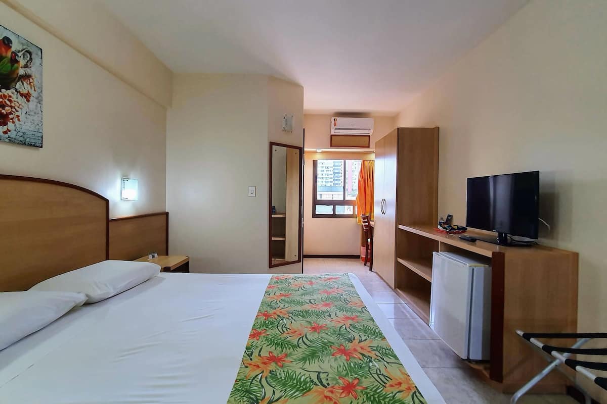 Minibar, desk, laptop workspace, blackout curtains