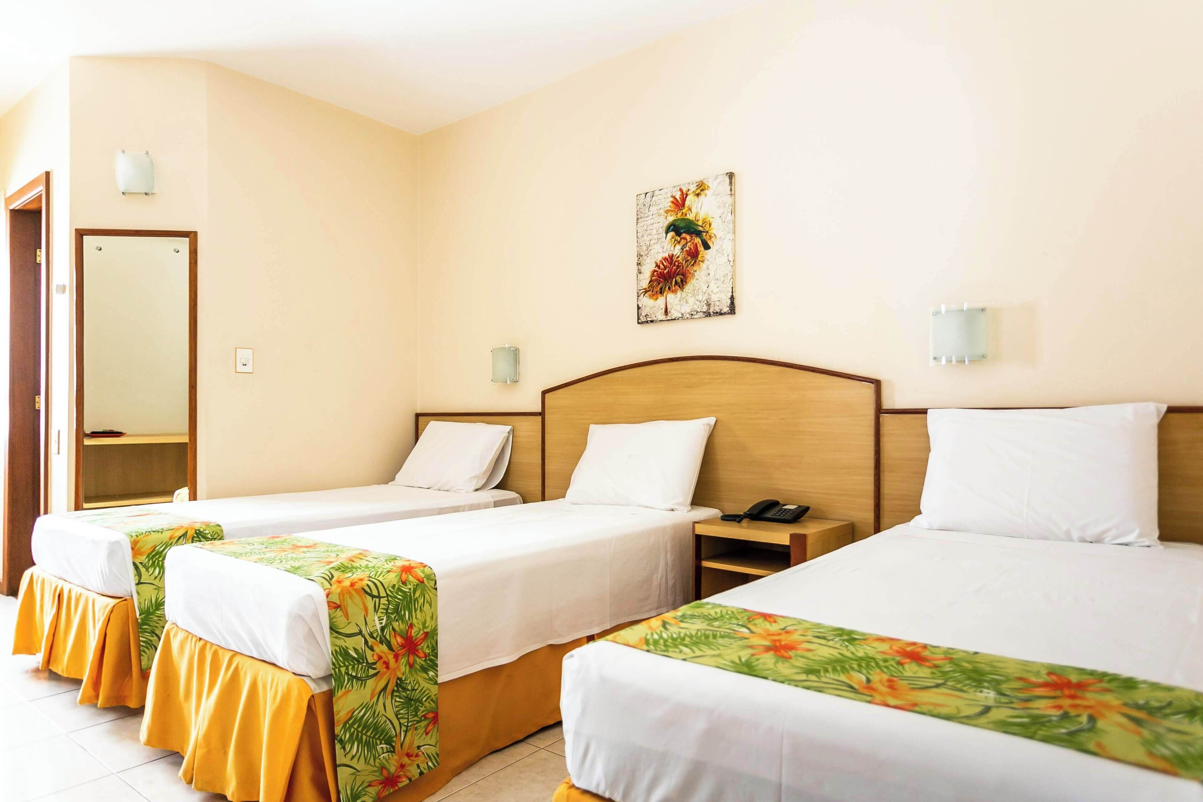 Executive Triple Room, Sea View, Sea Facing | Minibar, desk, laptop workspace, blackout drapes