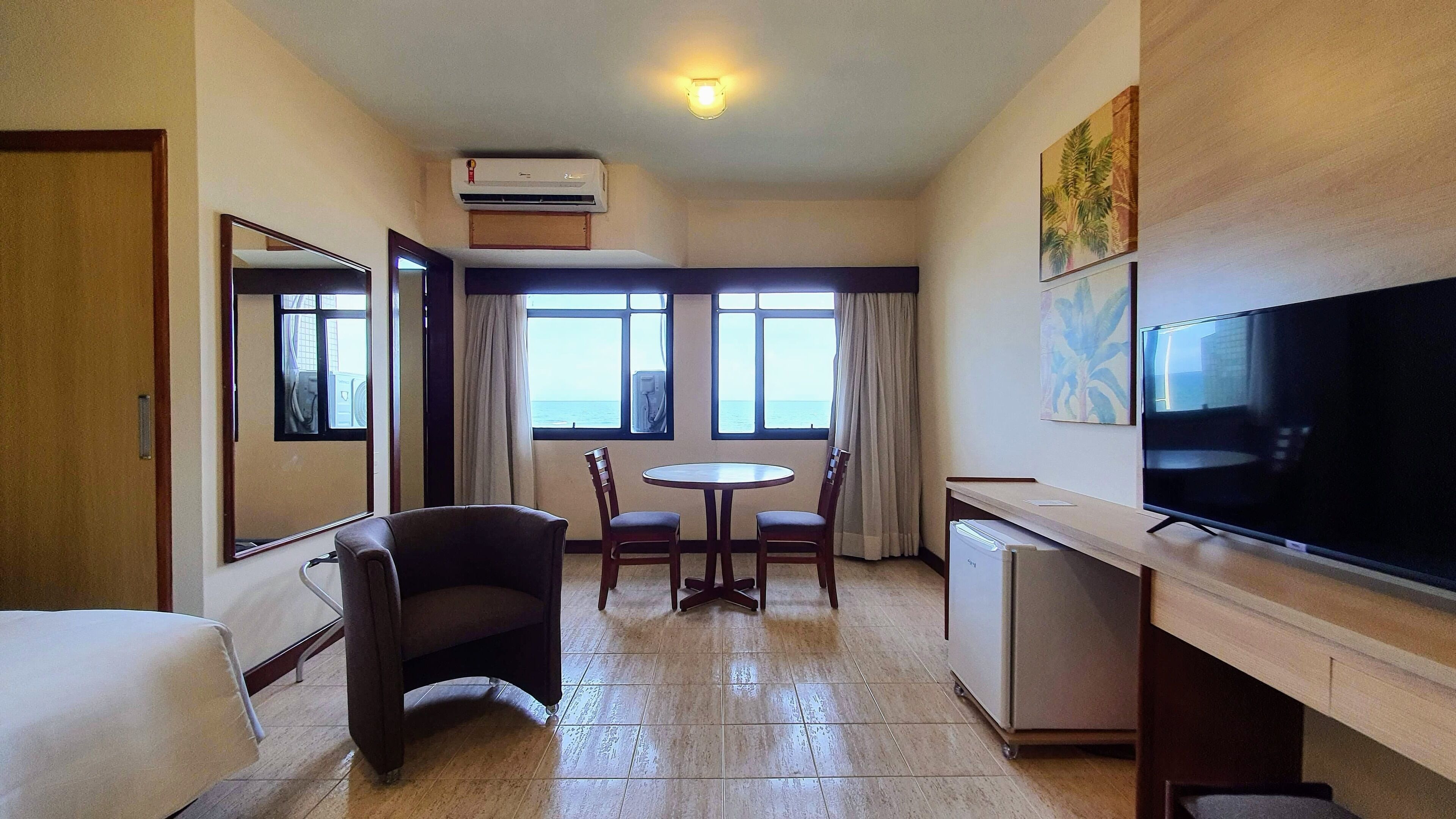 luxury double room, sea view, sea facing | 1 bedroom, minibar, desk, laptop workspace