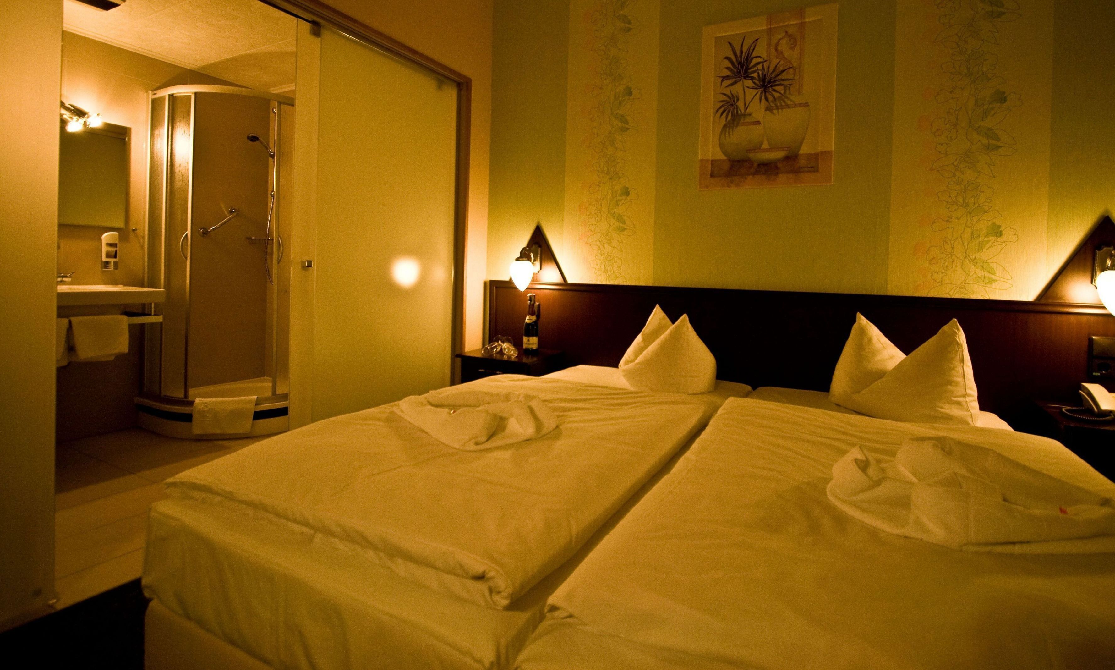 Premium bedding, pillow-top beds, in-room safe, desk