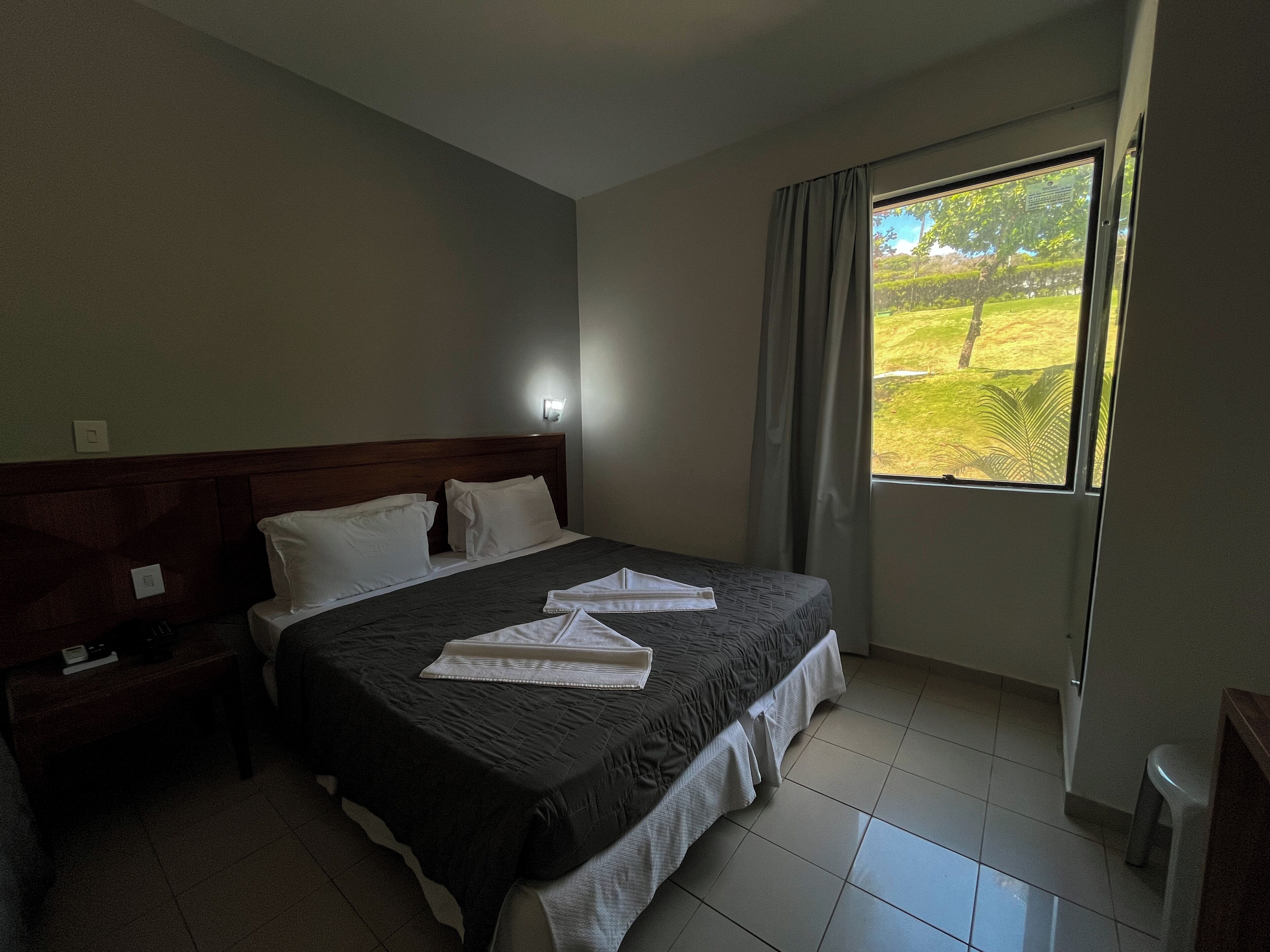 Quarto standard, vista para o jardim | Vista do quarto