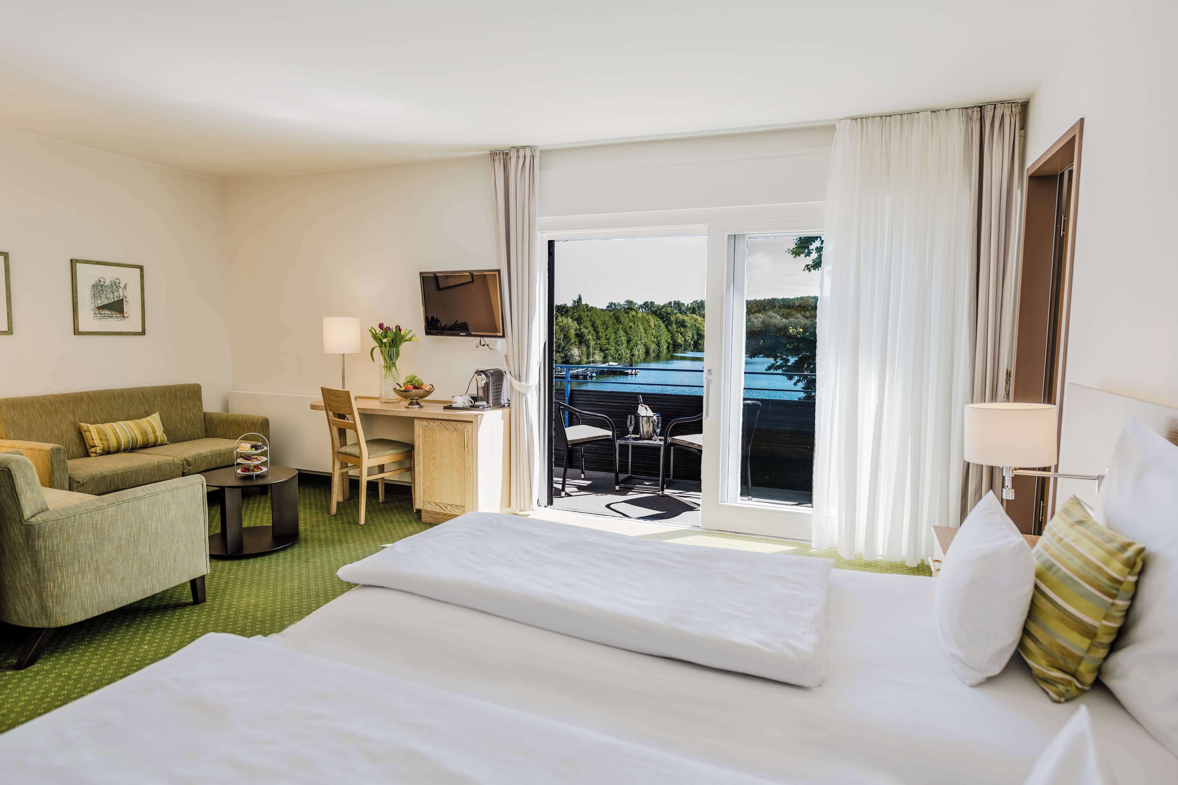 Standard Room, 1 Double Bed, Balcony, Lake View | Minibar, in-room safe, individually decorated, individually furnished