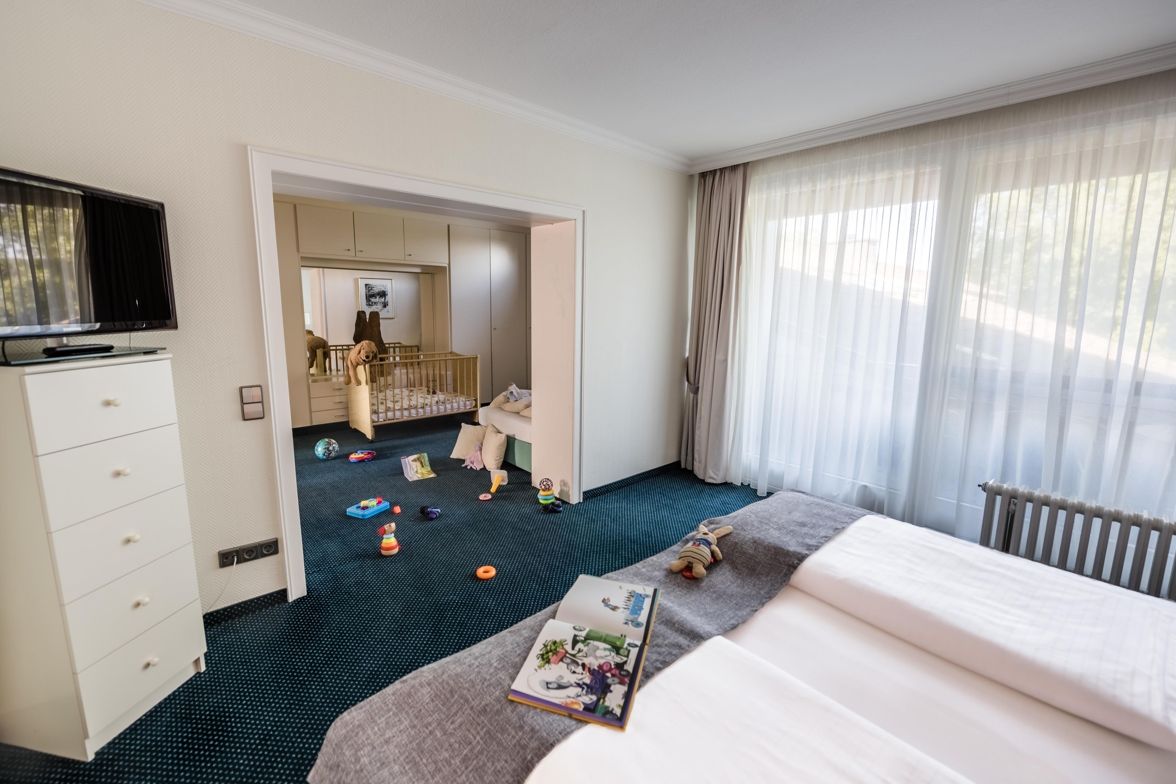 Family Room, 1 Double Bed, Lake View | Minibar, in-room safe, laptop workspace, blackout curtains