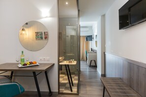Junior Suite, 1 Bedroom | Desk, soundproofing, iron/ironing board, free WiFi