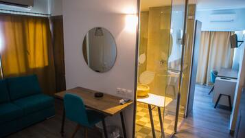 Junior Suite, 1 Bedroom | Living area | TV