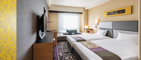 Roba de llit d'alta qualitat i caixa forta a l'habitació