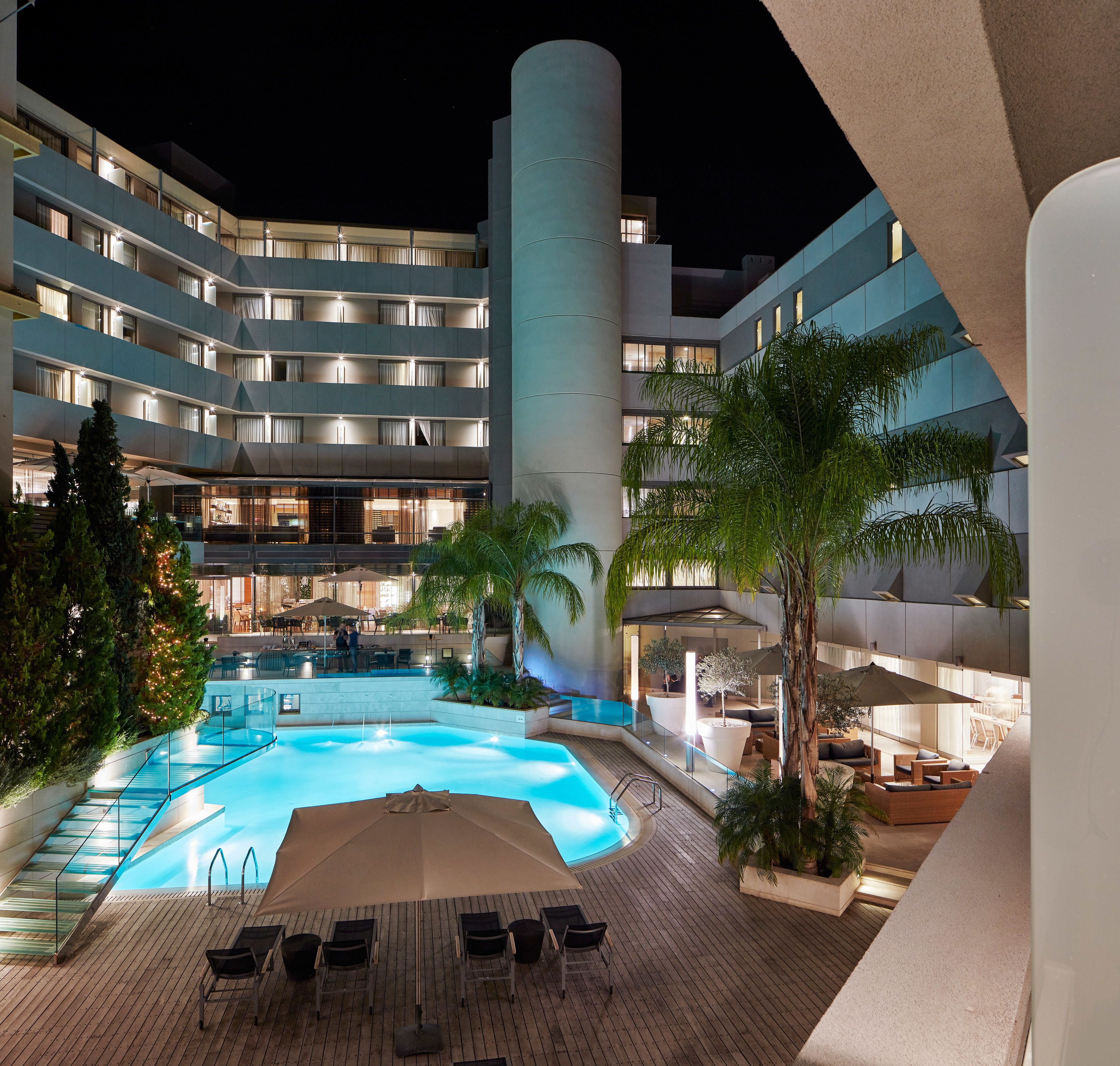 outdoor pool, pool umbrellas, pool loungers