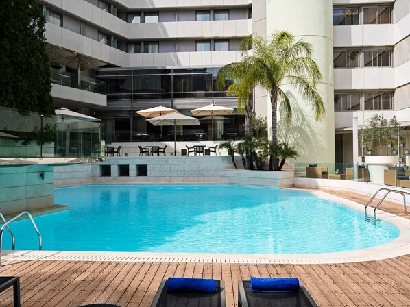 Outdoor pool, pool umbrellas, pool loungers