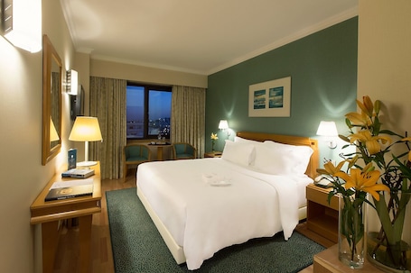 Double or Twin Room | Minibar, in-room safe, desk, blackout drapes