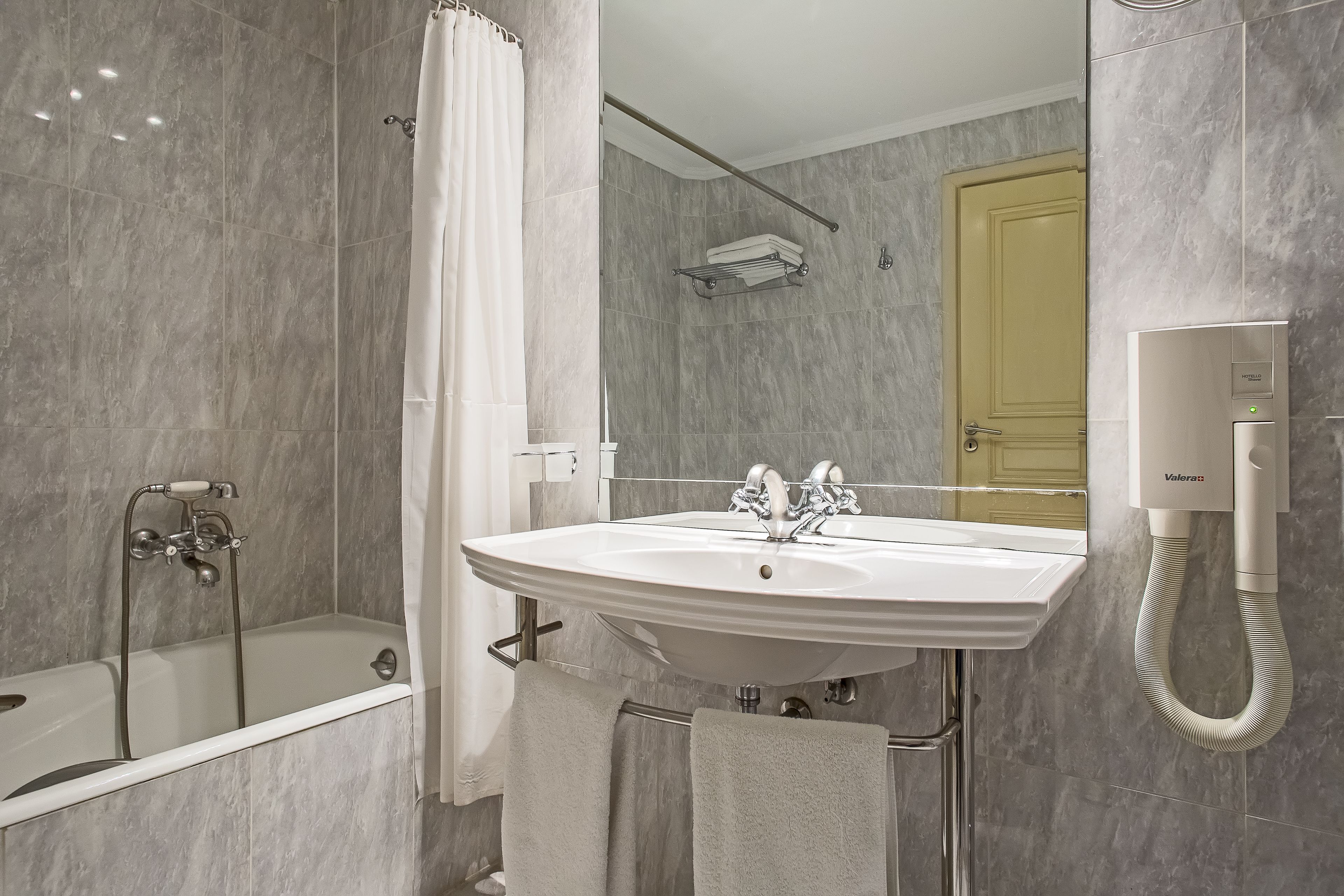 free toiletries, hair dryer, slippers, towels