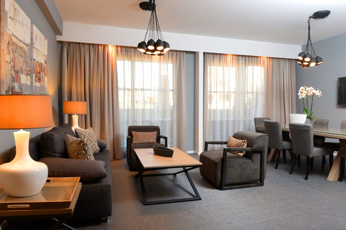 Penthouse | Living area | 49-inch LCD TV with satellite channels, TV