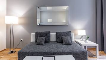 Apartamento familiar | Zona de estar | Smart TV de 55 pulgadas con canales por satélite, una televisión