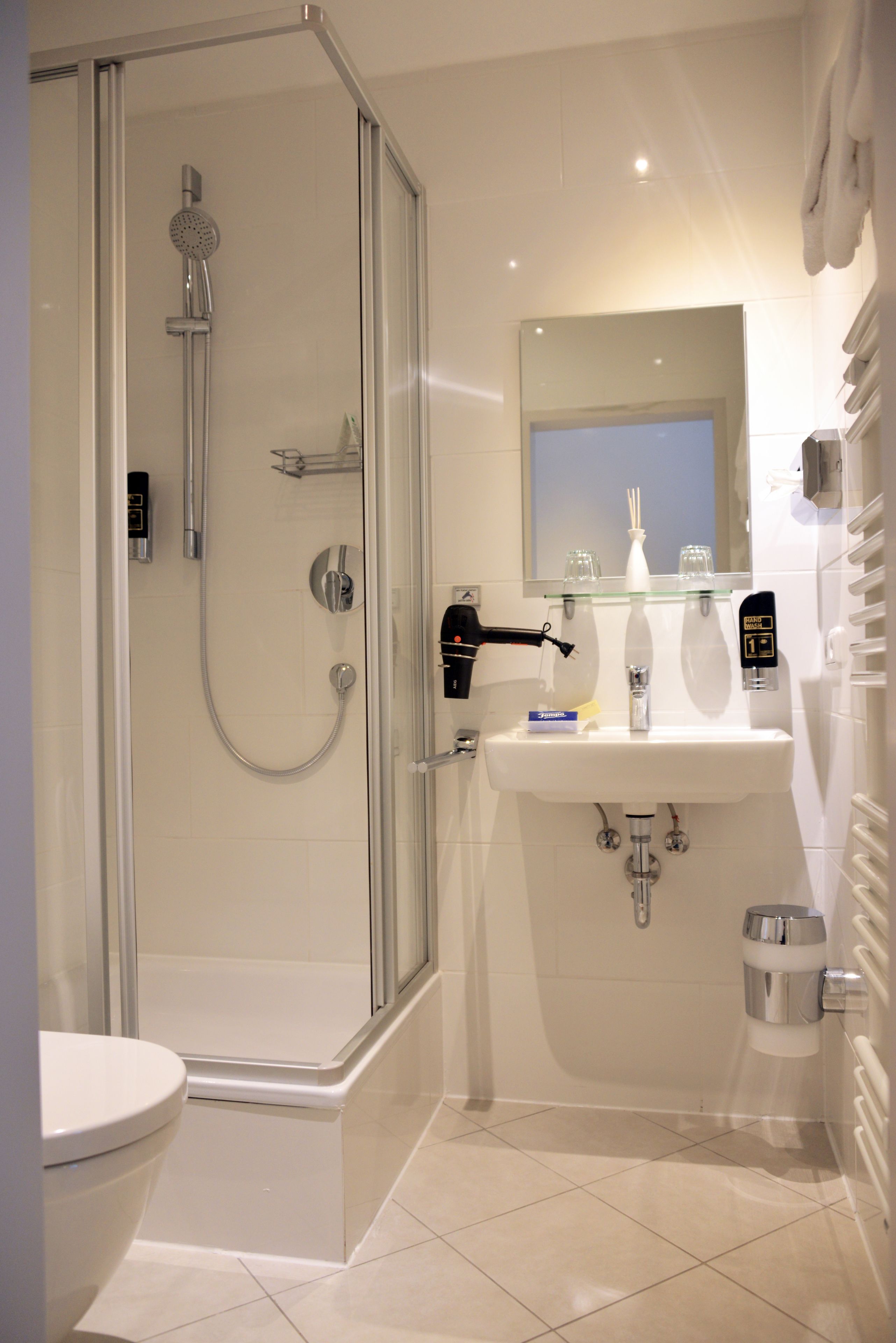 shower, free toiletries, hair dryer, towels