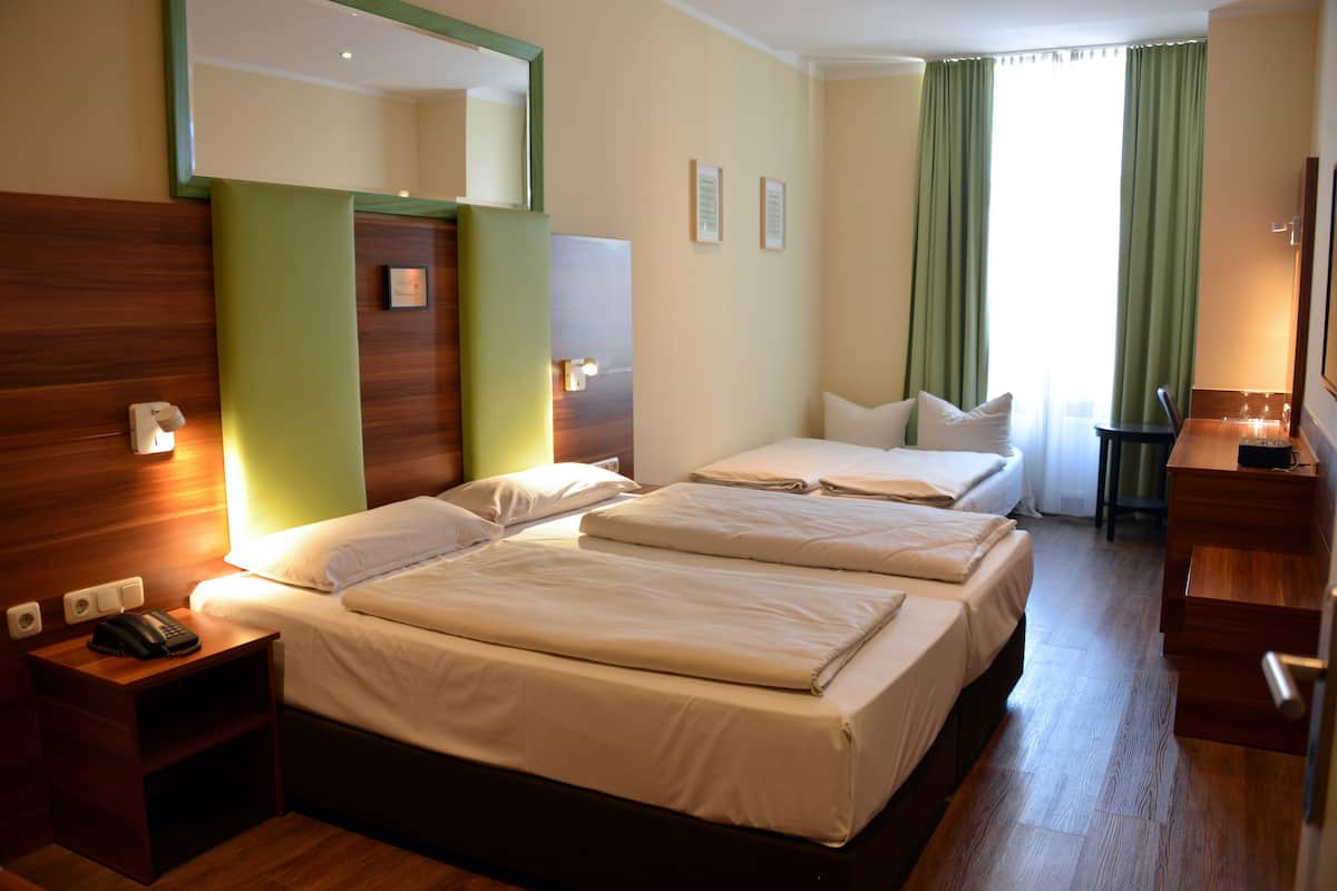 Standard Quadruple Room | Hypo-allergenic bedding, minibar, in-room safe, desk