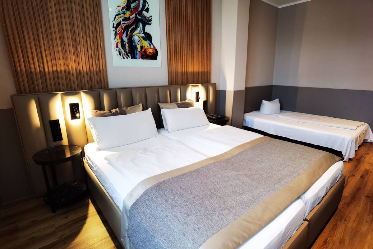 Standard Triple Room | Hypo-allergenic bedding available, minibar, in-room safe, desk