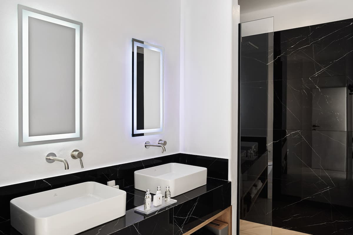 sanctuary 2 bedroom sea view villa with private pool | bathroom | shower, designer toiletries, hair dryer, bathrobes