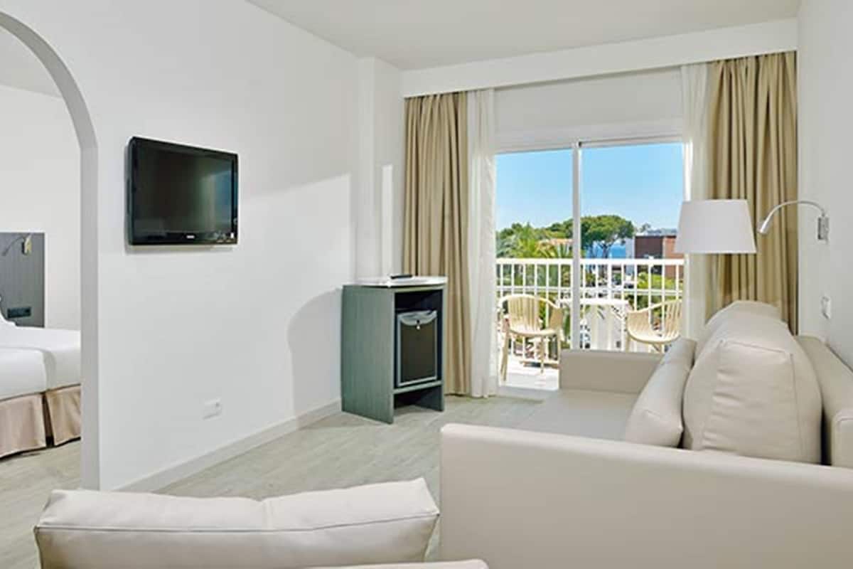 32-inch flat-screen TV with satellite channels, TV