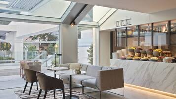 Breakfast, lunch, dinner served; international cuisine