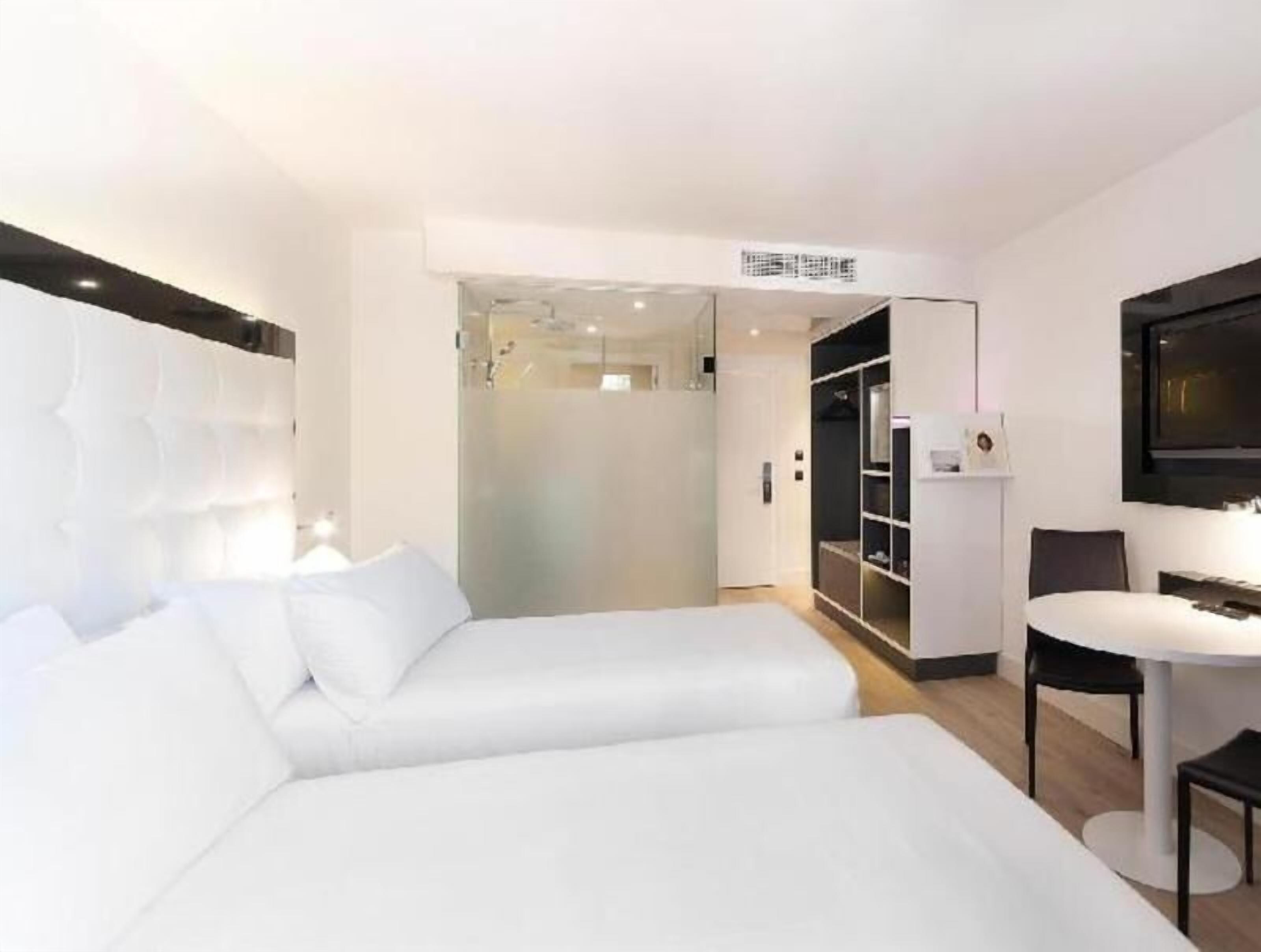 Free minibar items, in-room safe, desk, blackout drapes