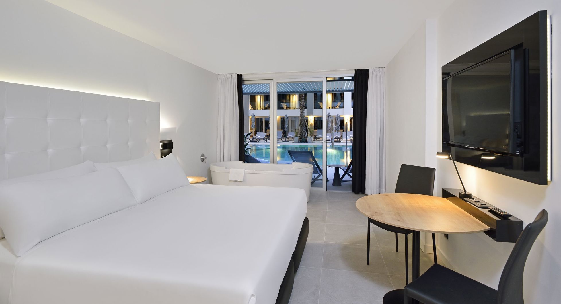 Free minibar items, in-room safe, desk, blackout drapes