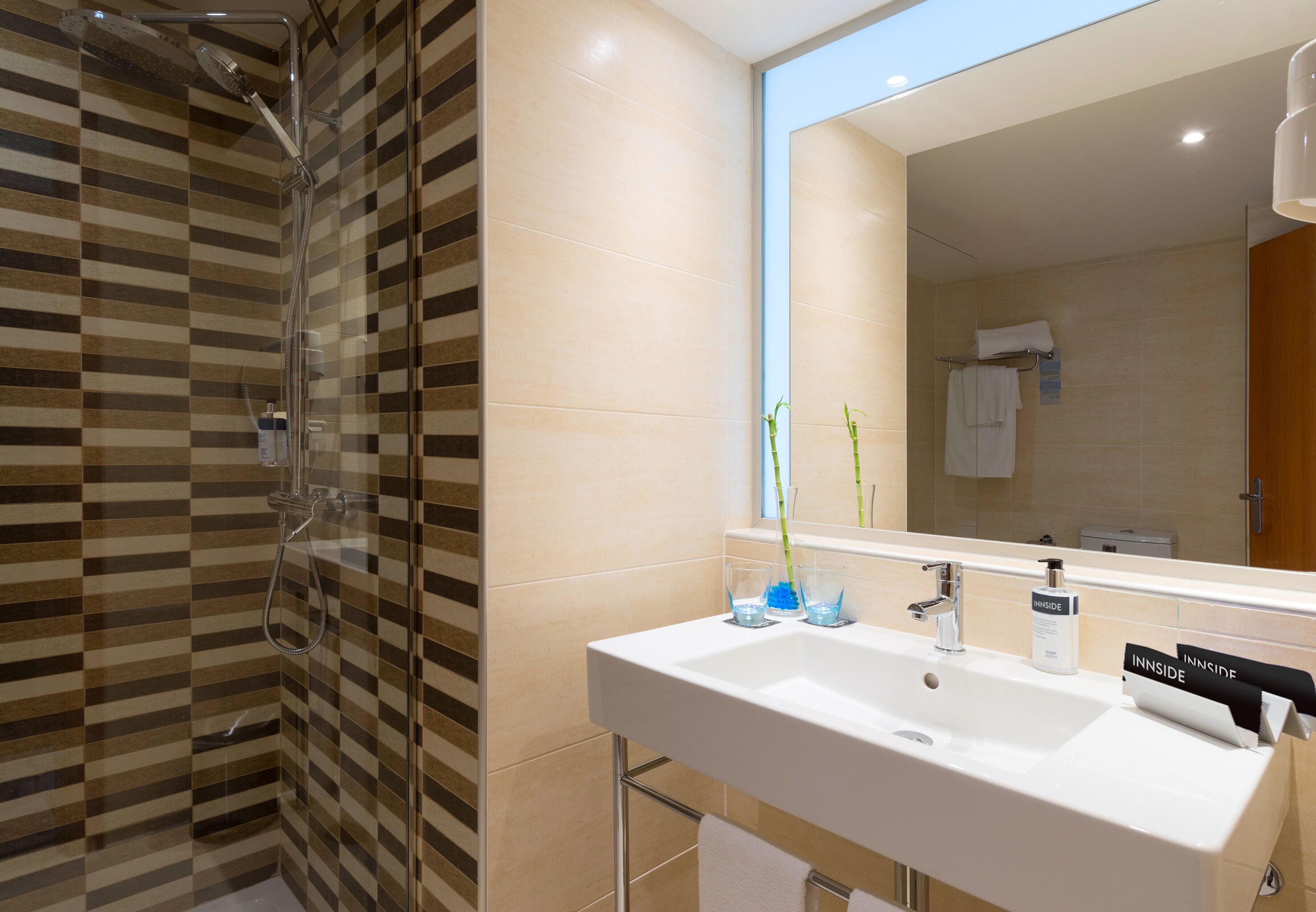 innside, standard room, balcony | free minibar items, in-room safe, desk, blackout curtains