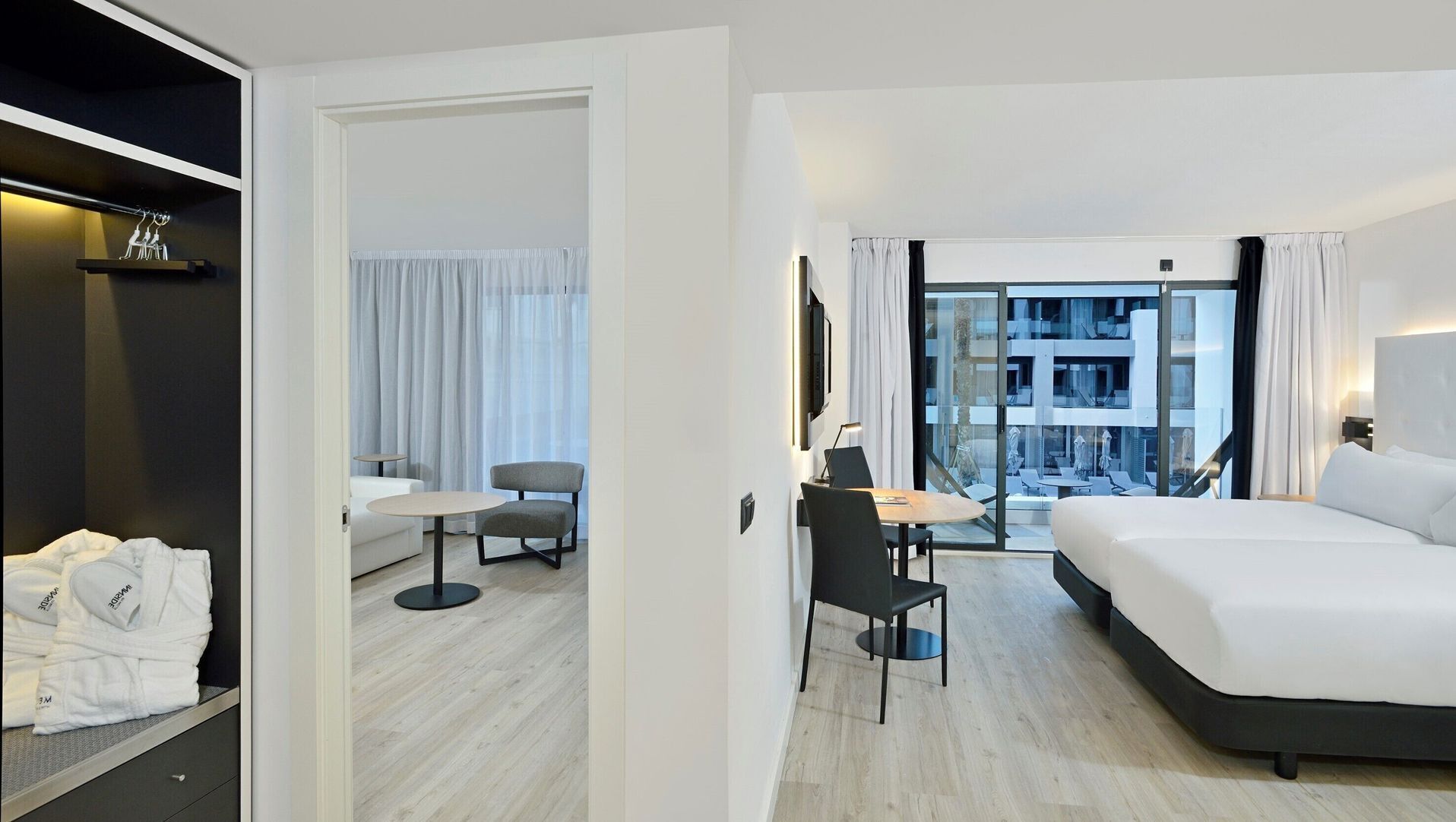 Free minibar items, in-room safe, desk, blackout drapes