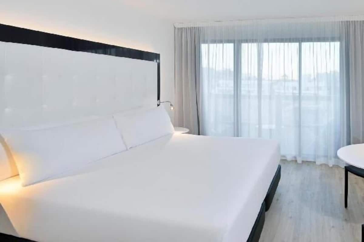 Free minibar items, in-room safe, desk, blackout drapes