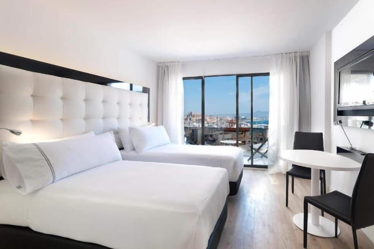 Free minibar items, in-room safe, desk, blackout drapes