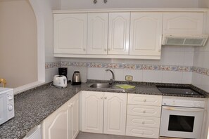 Fridge, microwave, stovetop, electric kettle