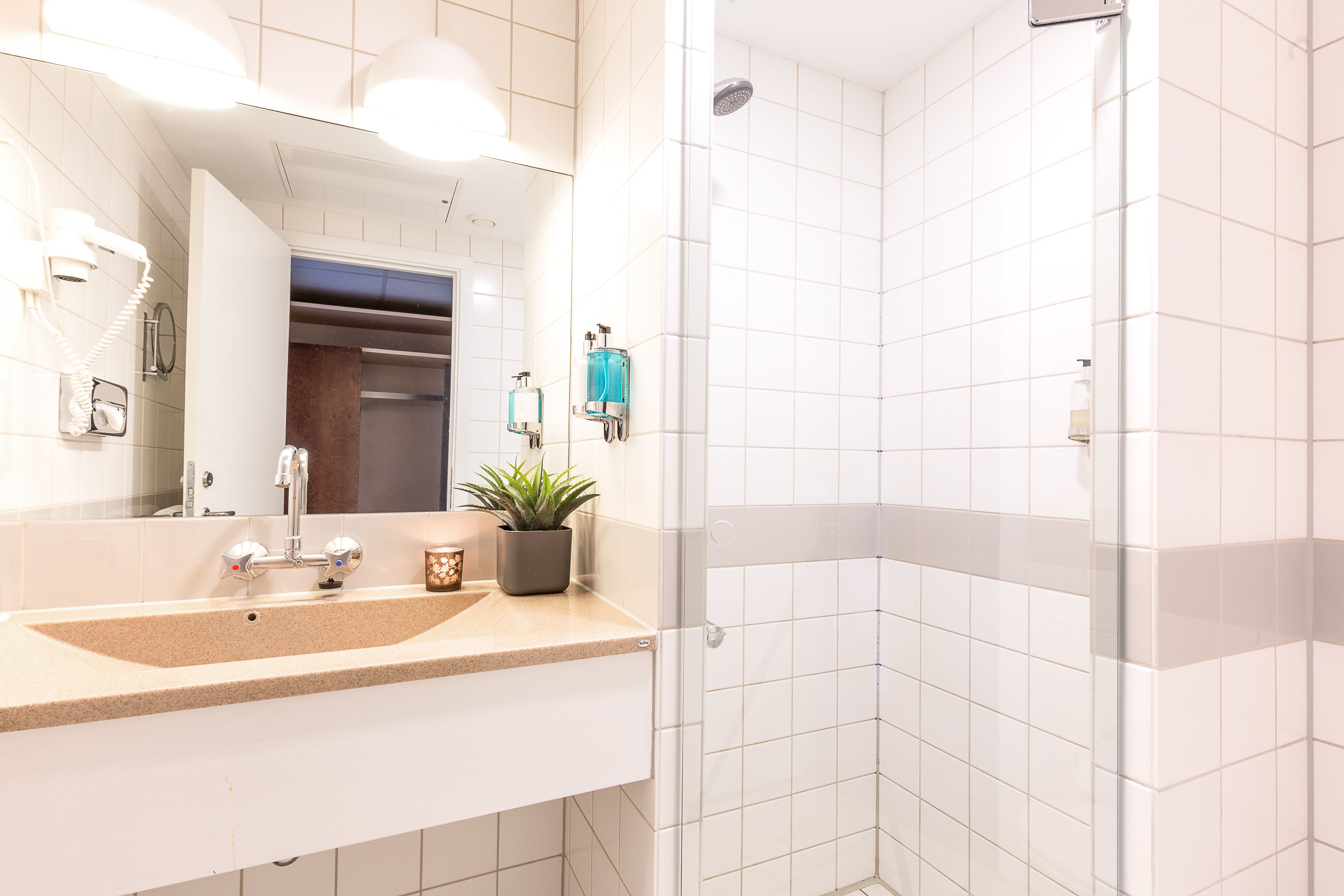 standard room | bathroom | shower, rainfall showerhead, hair dryer, towels