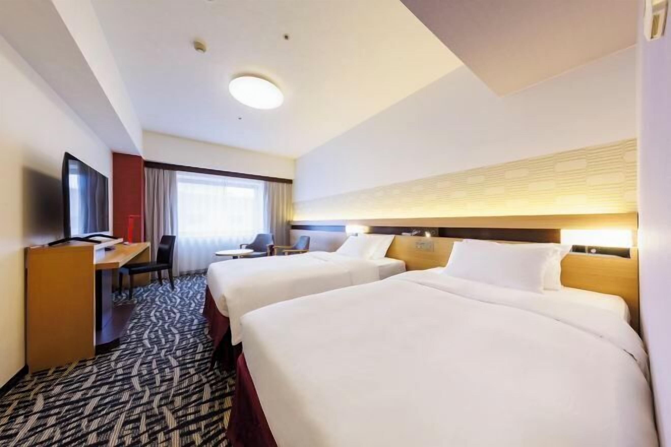 Down duvets, Select Comfort beds, in-room safe, laptop workspace