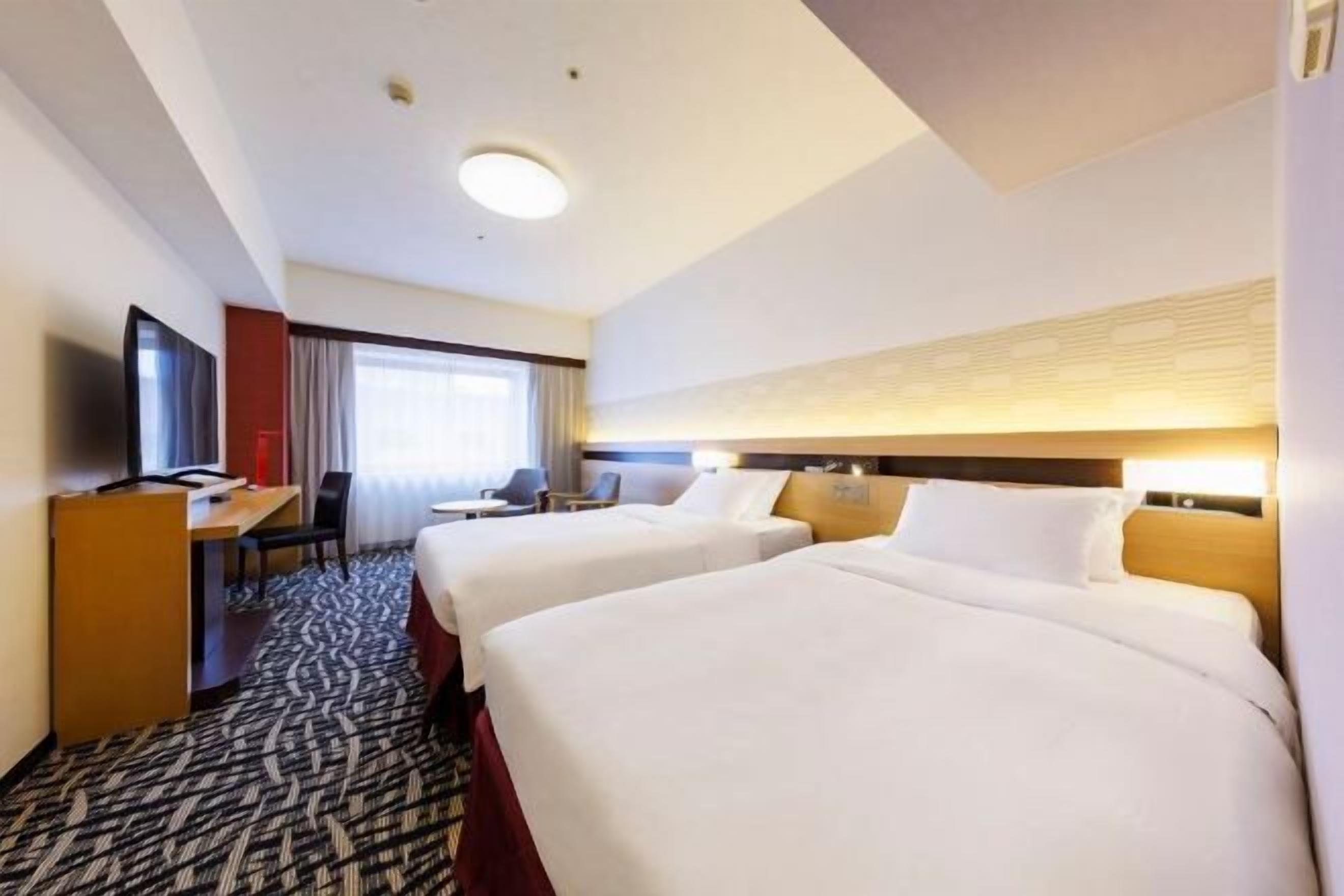 Down duvets, Select Comfort beds, in-room safe, laptop workspace