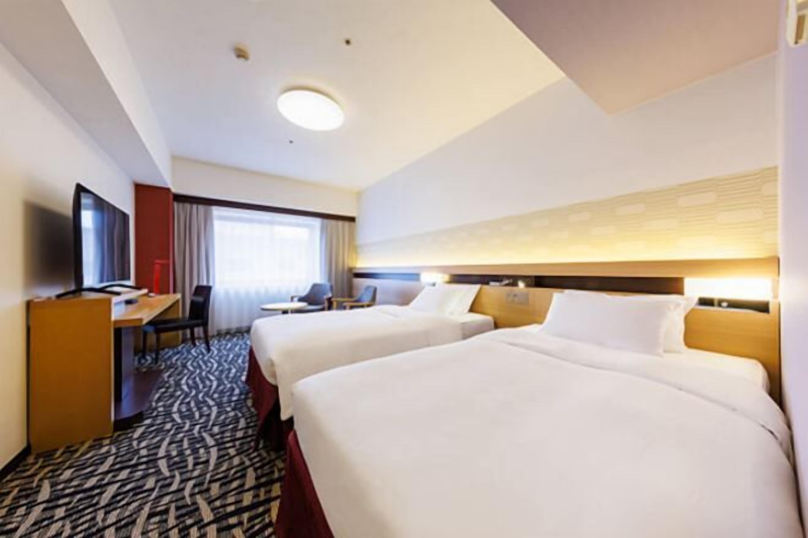 Down duvets, Select Comfort beds, in-room safe, laptop workspace