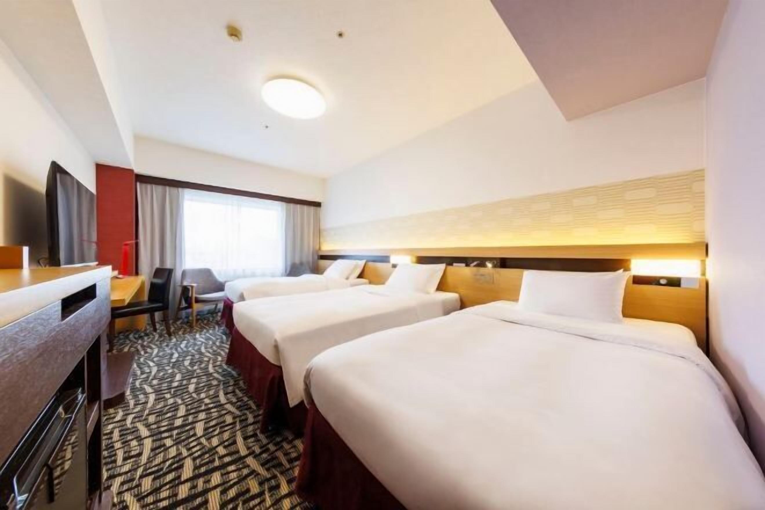 Down duvets, Select Comfort beds, in-room safe, laptop workspace