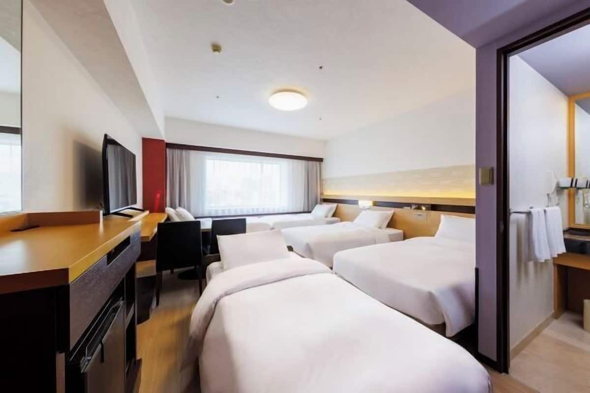 Down duvets, Select Comfort beds, in-room safe, laptop workspace