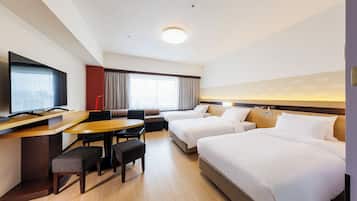 Premium bedding, down comforters, in-room safe, laptop workspace
