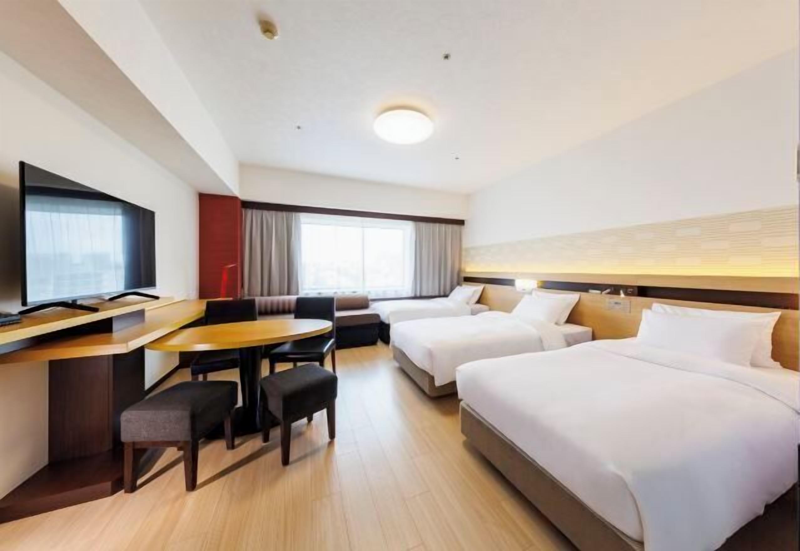 Down duvets, Select Comfort beds, in-room safe, laptop workspace