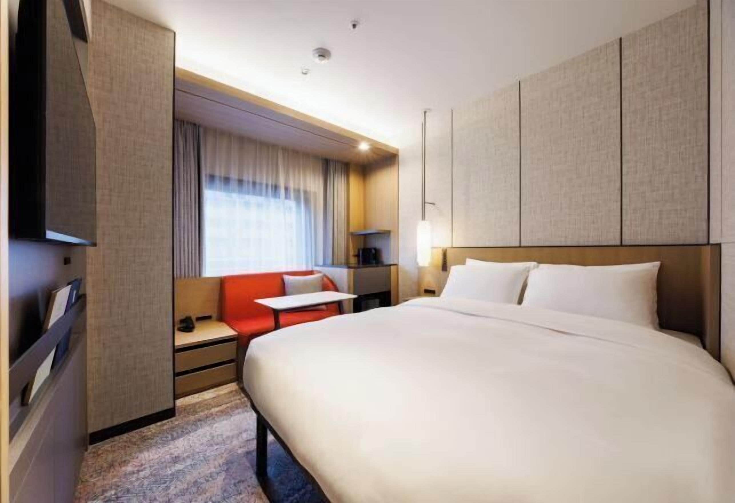 Down duvets, Select Comfort beds, in-room safe, laptop workspace